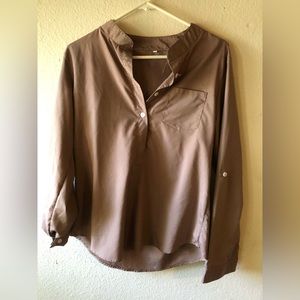 Satin blouse can button to make sleeves midway